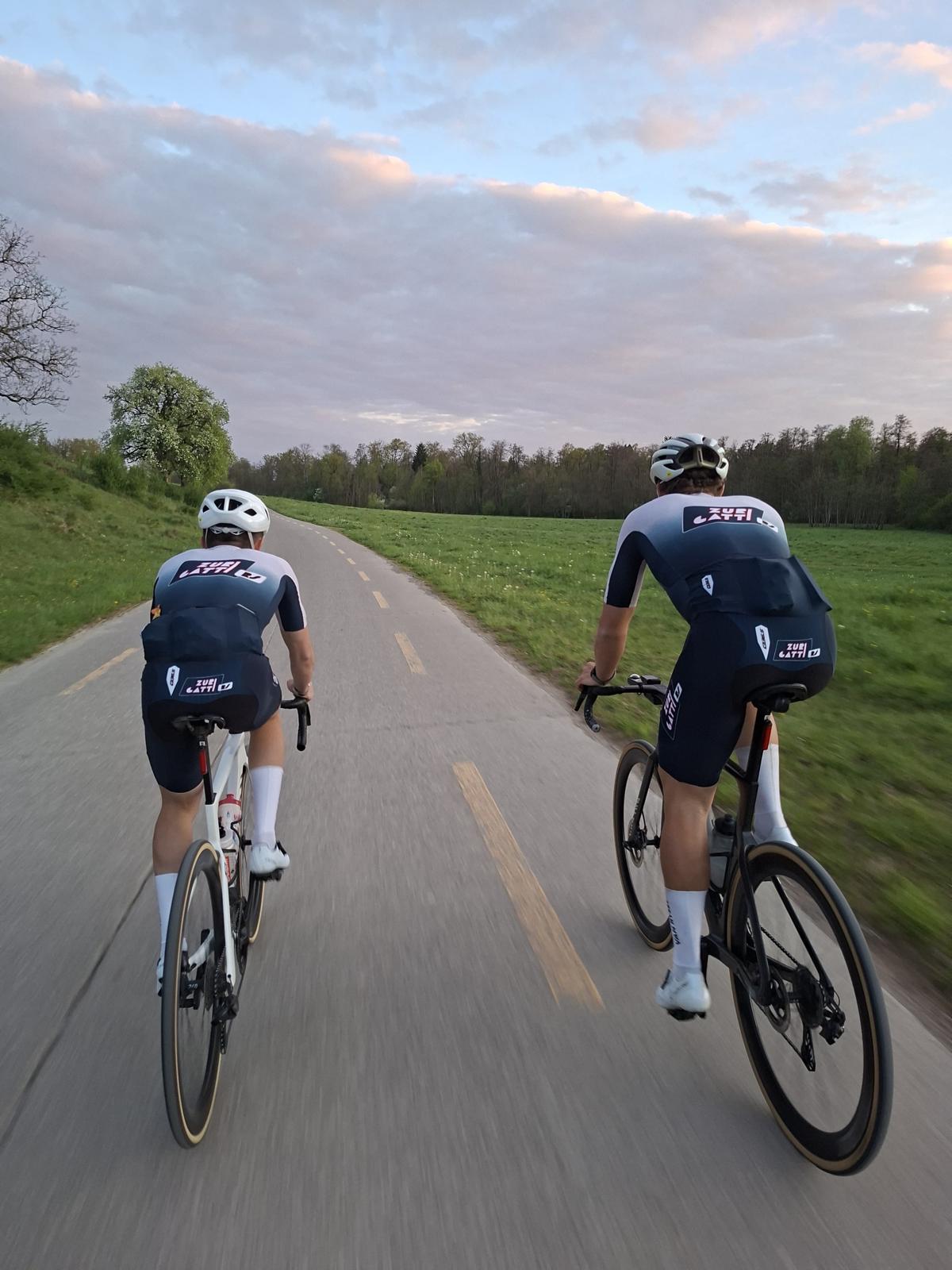 Two riders on open road